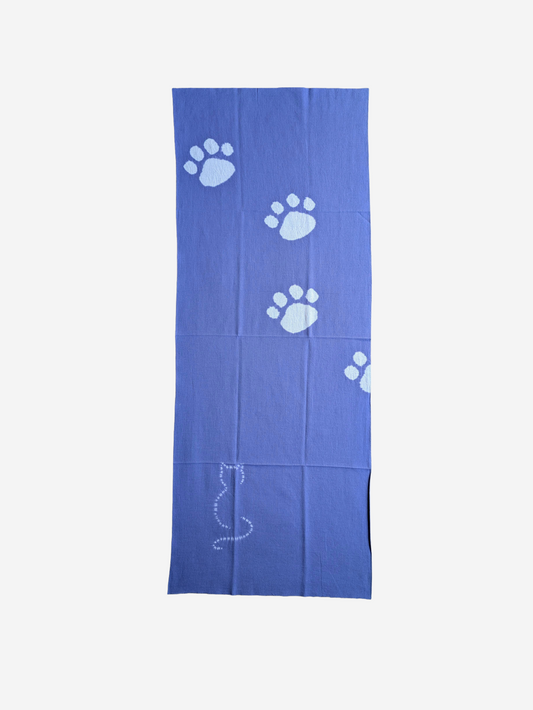 Blue tenugui cloth with white paw prints and a cat silhouette on a white background