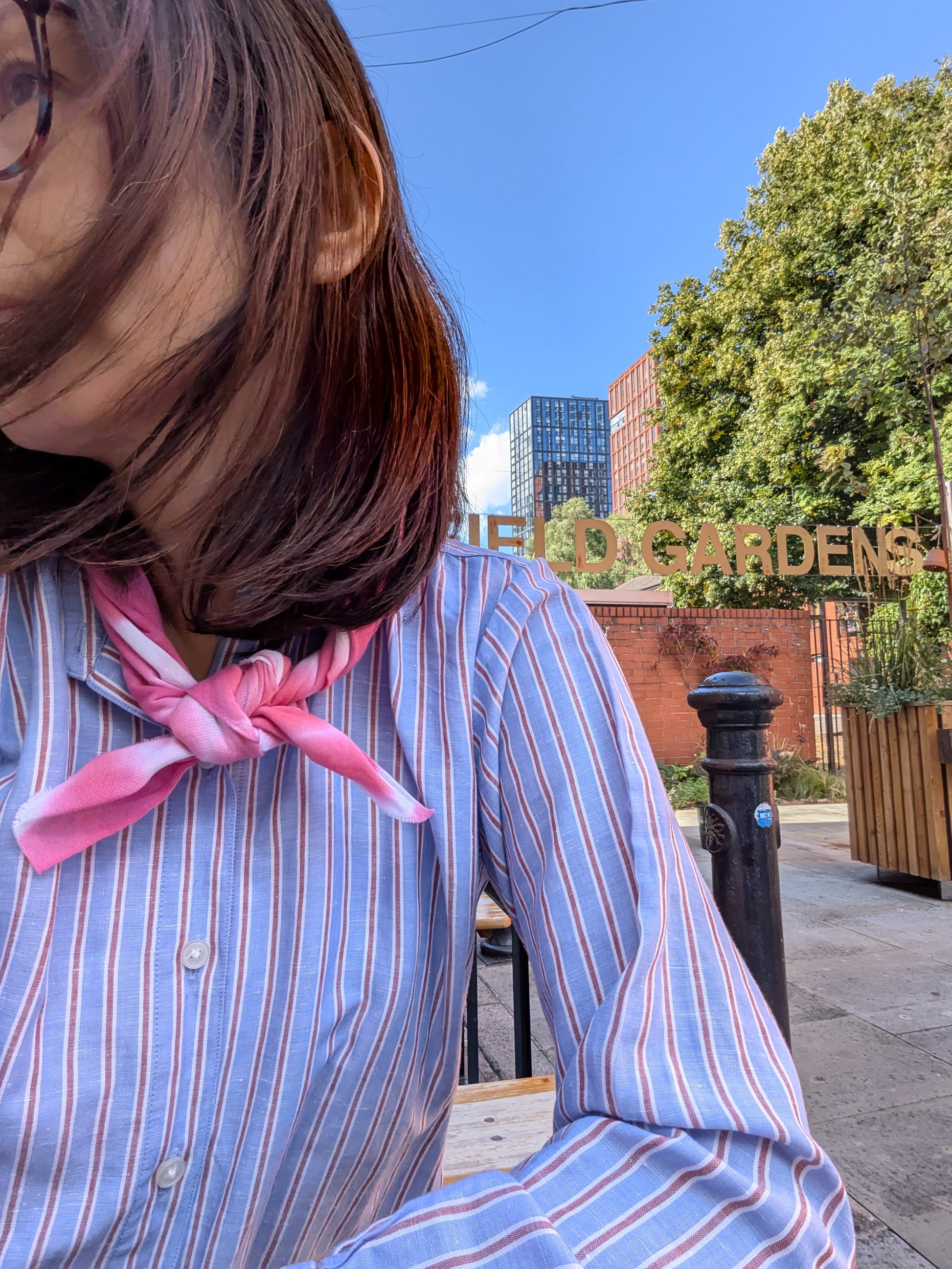 pink tenugui using as a scarf