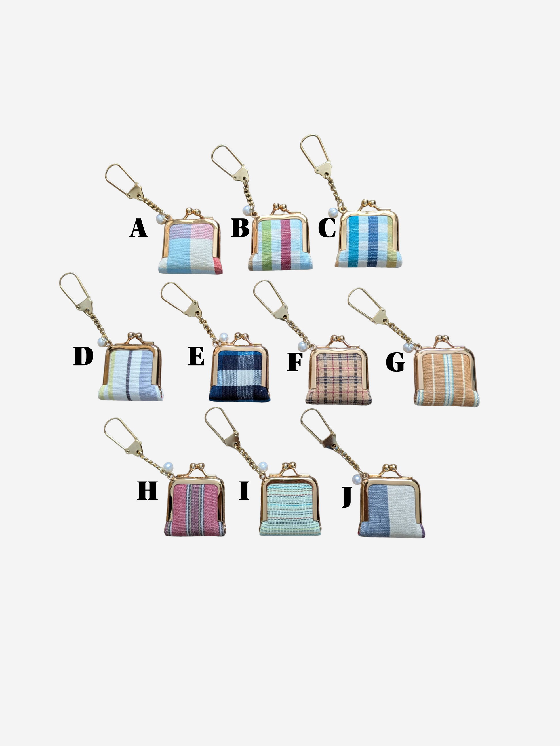 Set of small patterned keychains on a white background