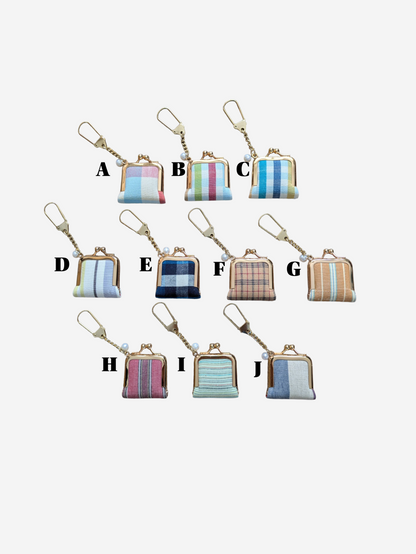 Set of small patterned keychains on a white background