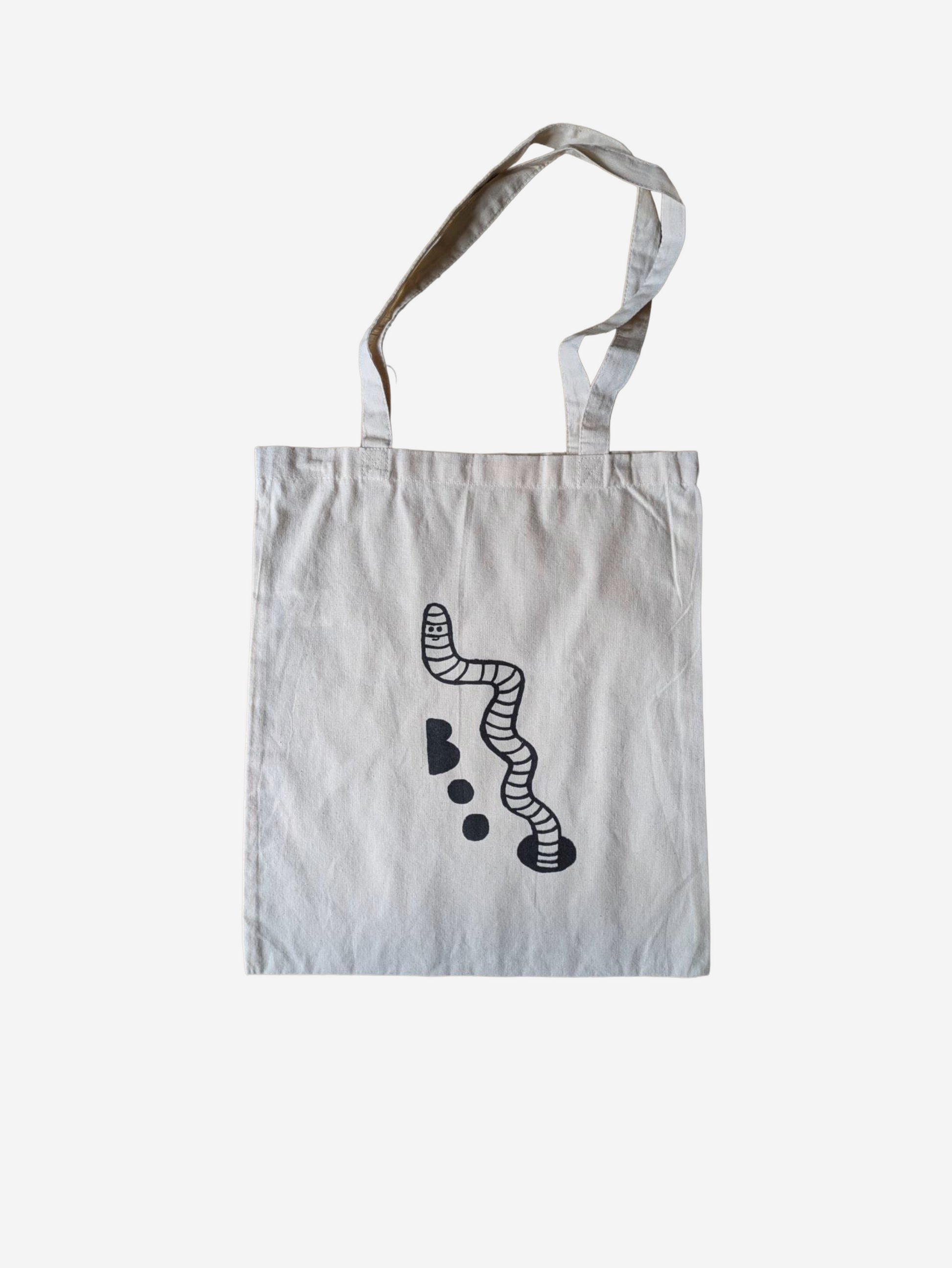 White tote bag with halloween worm on a white background